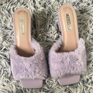 Fluffed purple heels